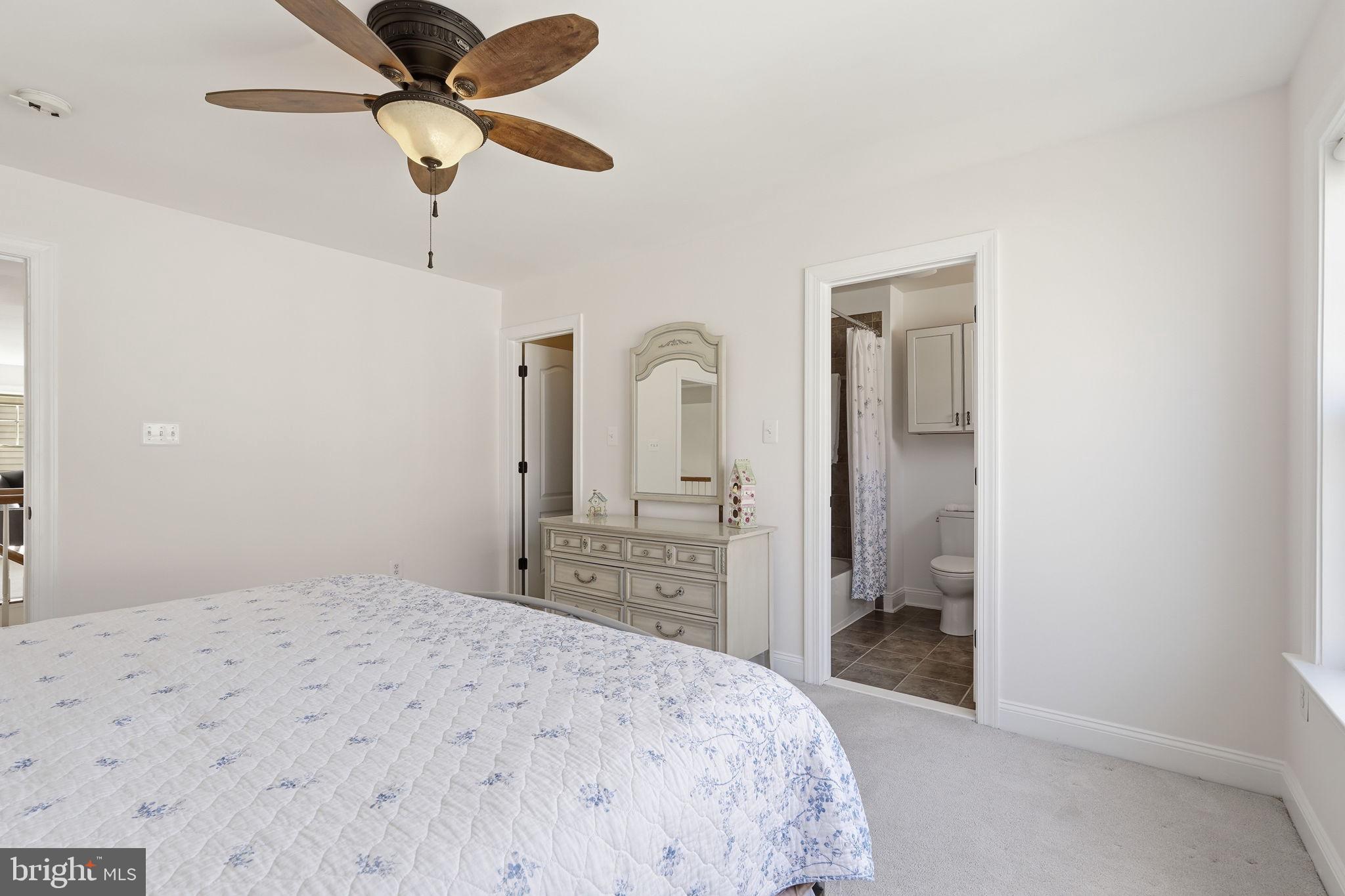 105 Turnstone Lane White Post, VA 22663 - Photo 27 of 77 a bedroom with a bed and a dresser