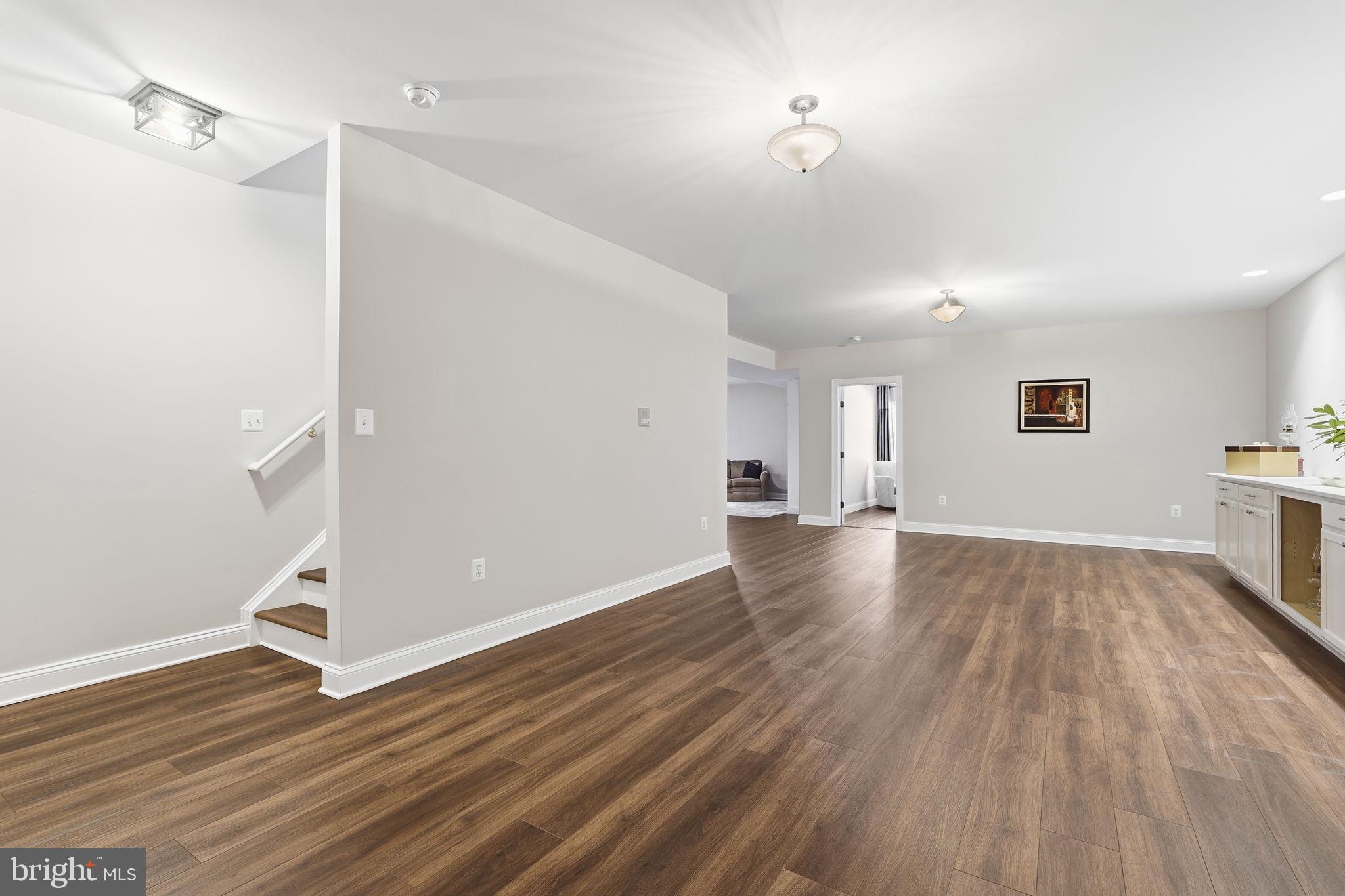 105 Turnstone Lane White Post, VA 22663 - Photo 28 of 77 a view of a room with wooden floor and window