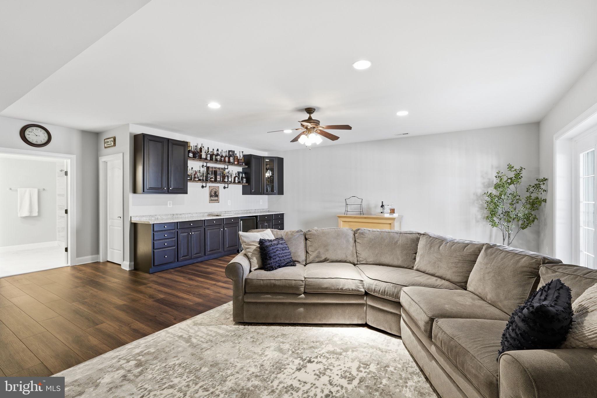 105 Turnstone Lane White Post, VA 22663 - Photo 34 of 77 a living room with furniture and a wooden floor