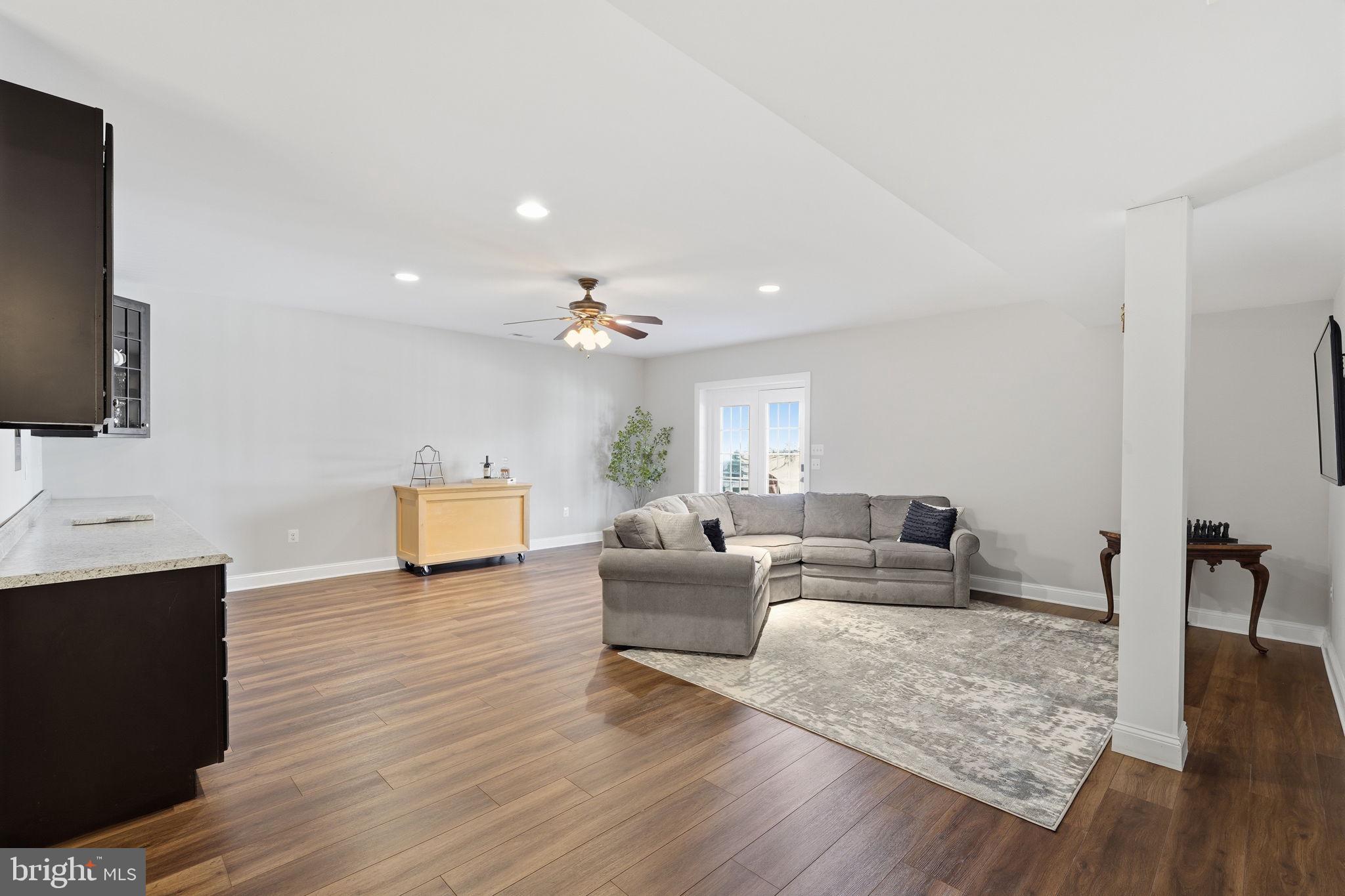 105 Turnstone Lane White Post, VA 22663 - Photo 35 of 77 a living room with furniture and a flat screen tv