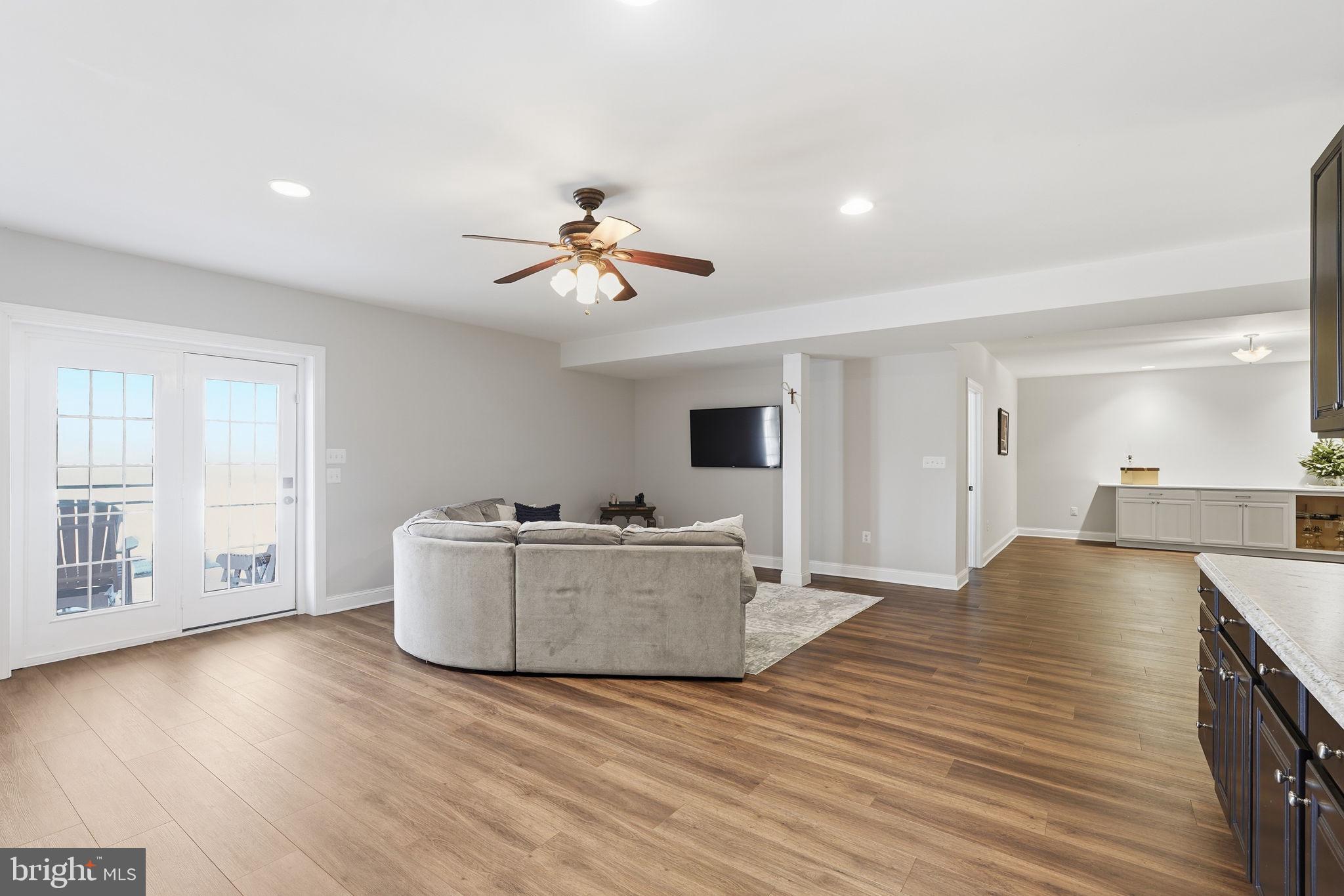 105 Turnstone Lane White Post, VA 22663 - Photo 36 of 77 a living room with furniture and a wooden floor