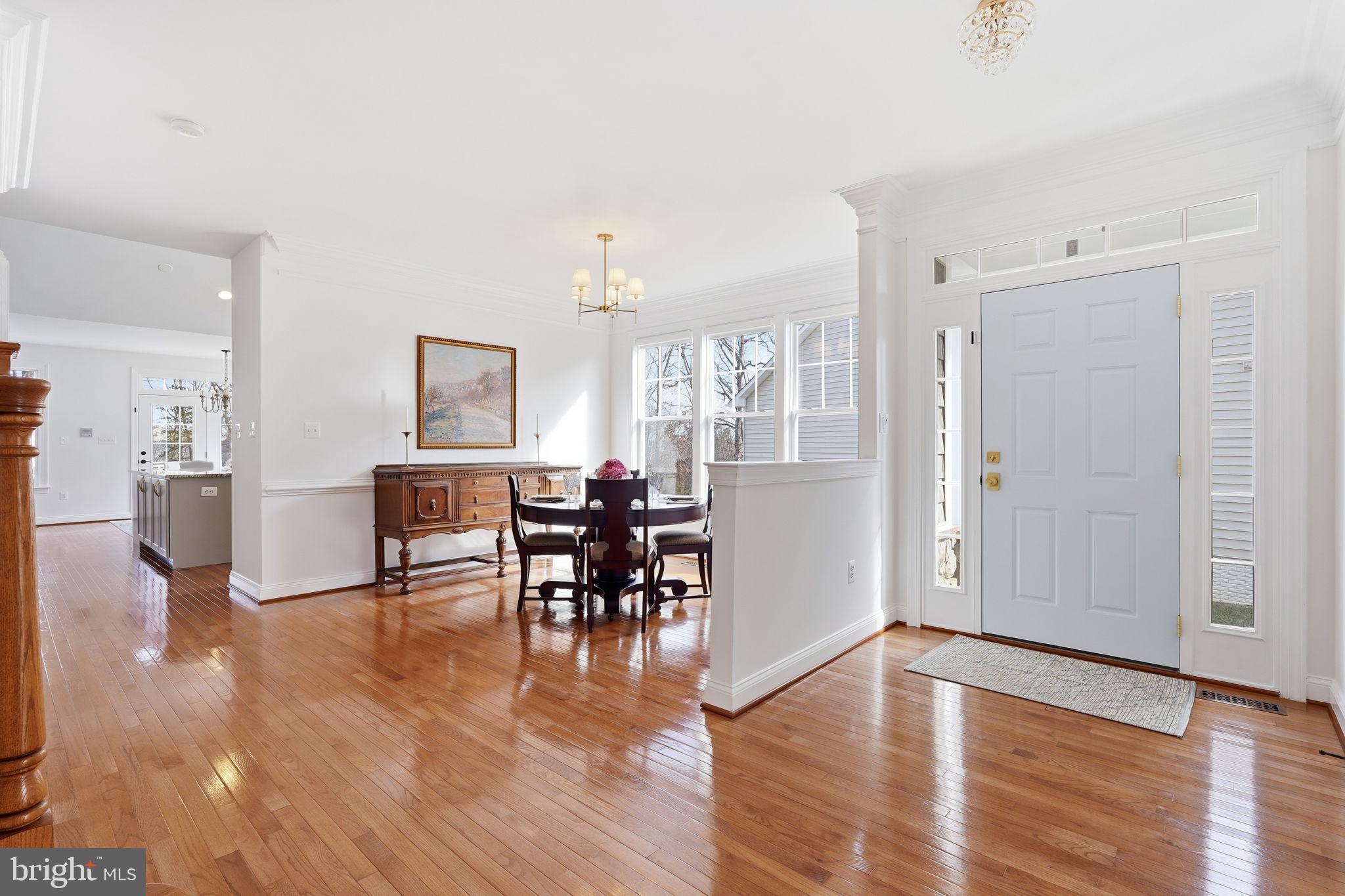 105 Turnstone Lane White Post, VA 22663 - Photo 6 of 77 a view of a dining room with furniture and wooden floor