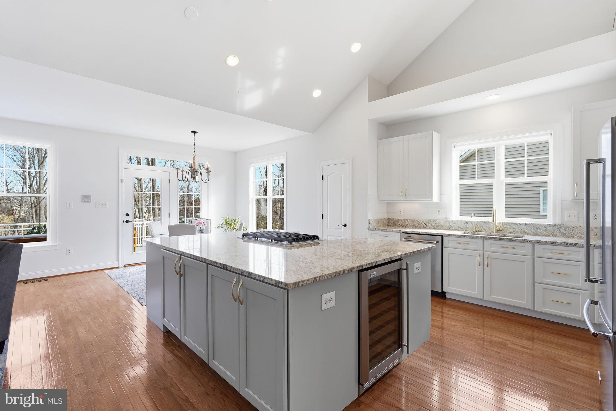 105 Turnstone Lane White Post, VA 22663 - Photo 9 of 77 a kitchen with granite countertop a sink and cabinets