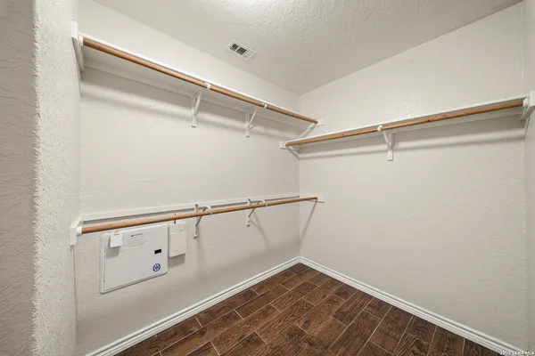 a view of an empty walk in closet