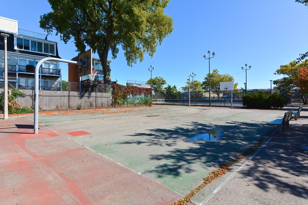 269 Webster Street, Unit 4 Boston, MA 02128 - Photo 33 of 36 a view of a swimming pool with a patio