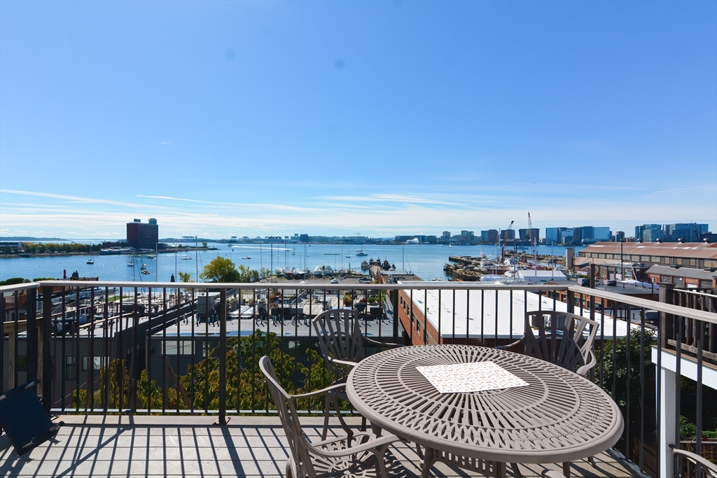 269 Webster Street, Unit 4 Boston, MA 02128 - Photo 4 of 36 a view of roof deck with seating space