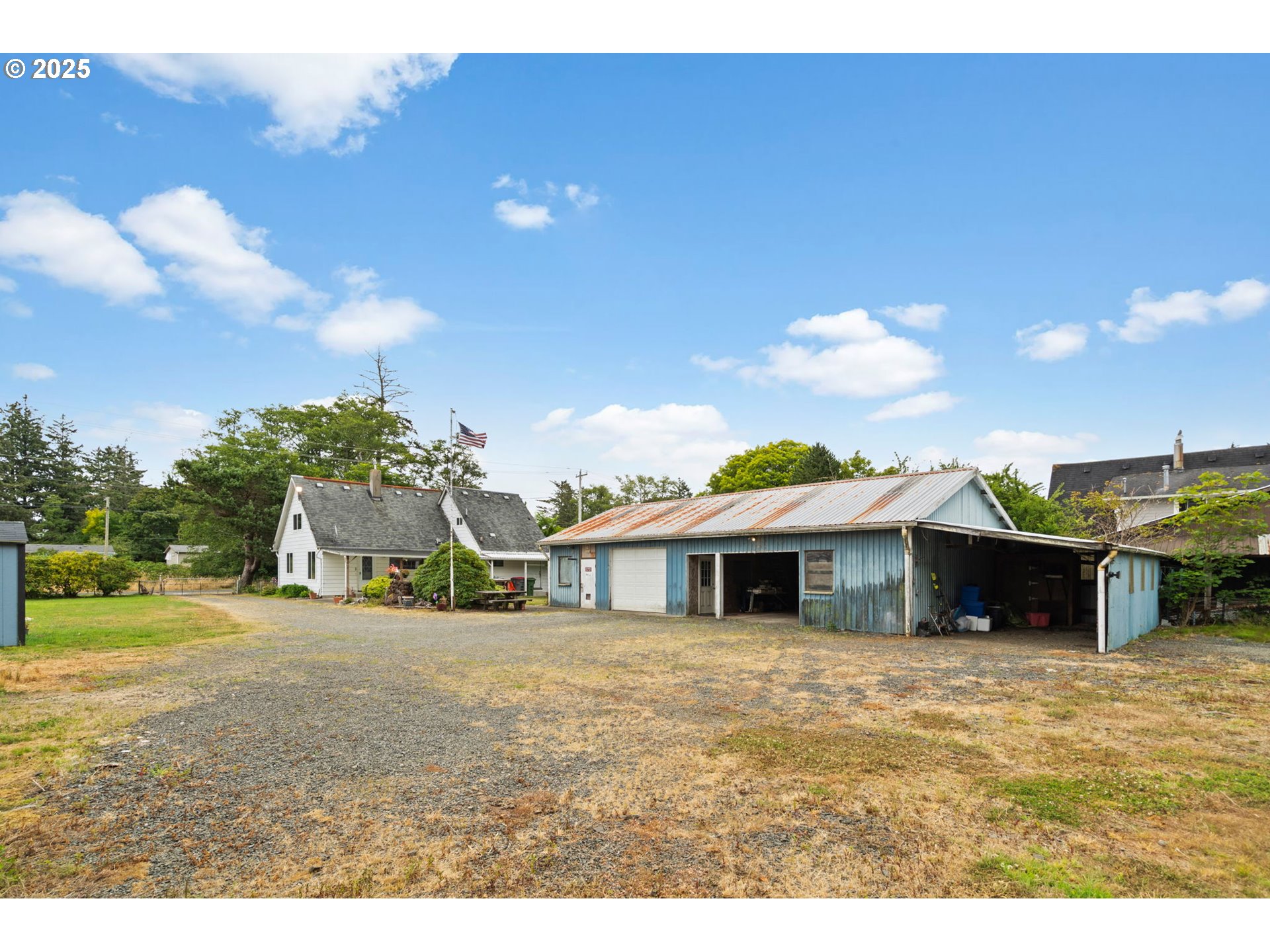 472 7th Avenue Hammond, OR 97121 - Photo 25 of 32 a view of a house with backyard porch and kitchen