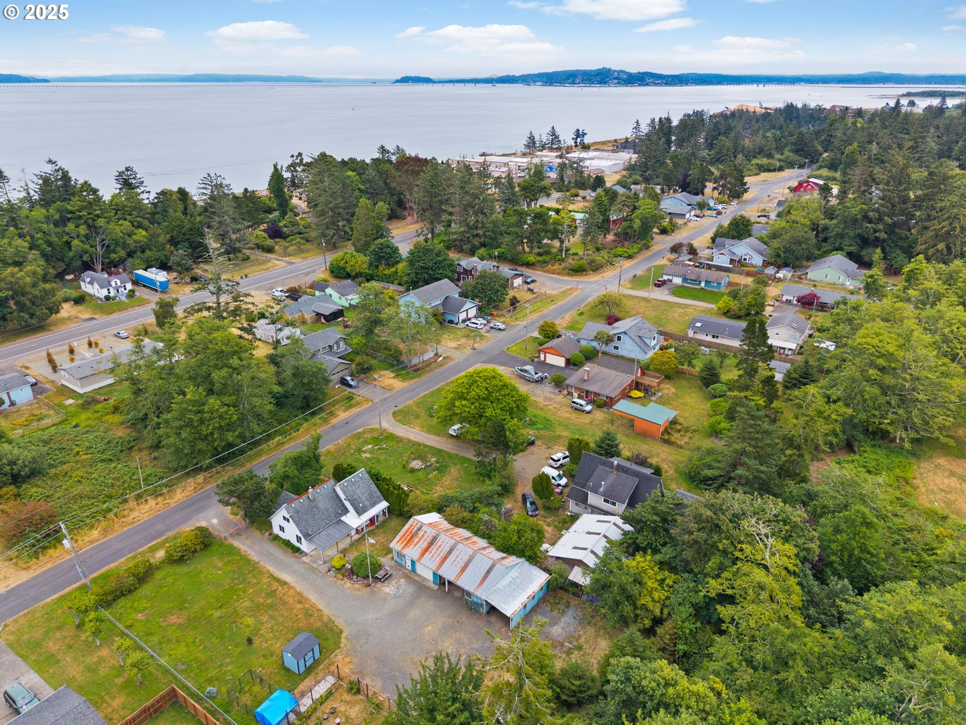 472 7th Avenue Hammond, OR 97121 - Photo 32 of 32 an aerial view of residential houses with outdoor space