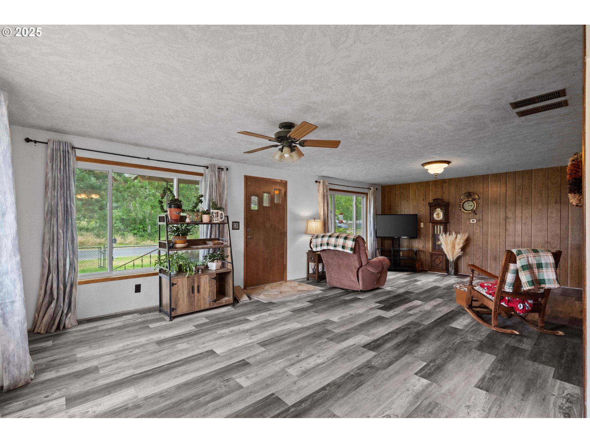 472 7th Avenue Hammond, OR 97121 - Photo 8 of 32 a bedroom with furniture and a large window
