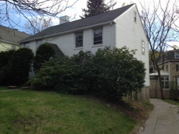 165-167 Langley Road Newton, MA 02459 - Photo 3 of 37 a backyard of a house with lots of green space