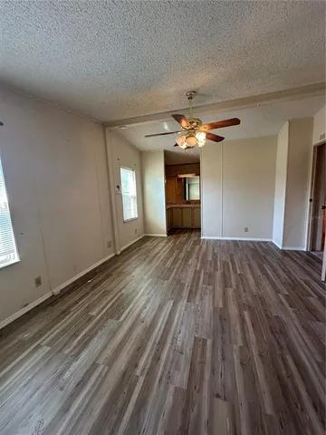 a bathroom with a sink vanity mirror and toilet