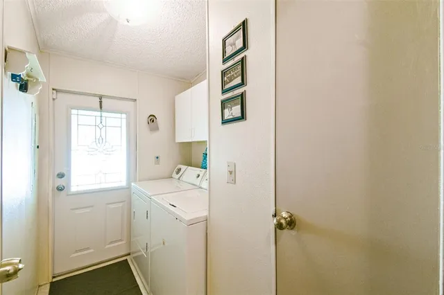 a bathroom with a tub and a shower