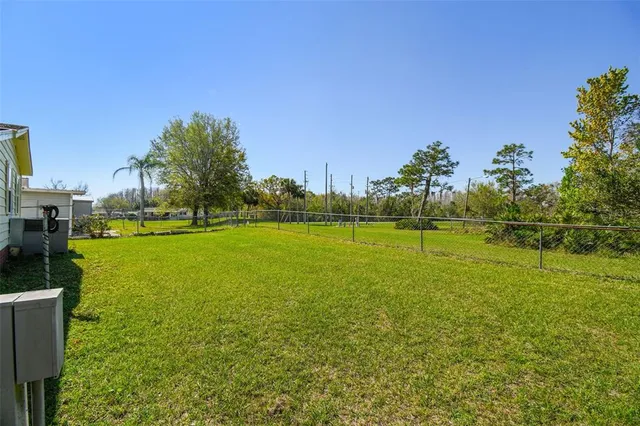 a view of an outdoor space and a lake view
