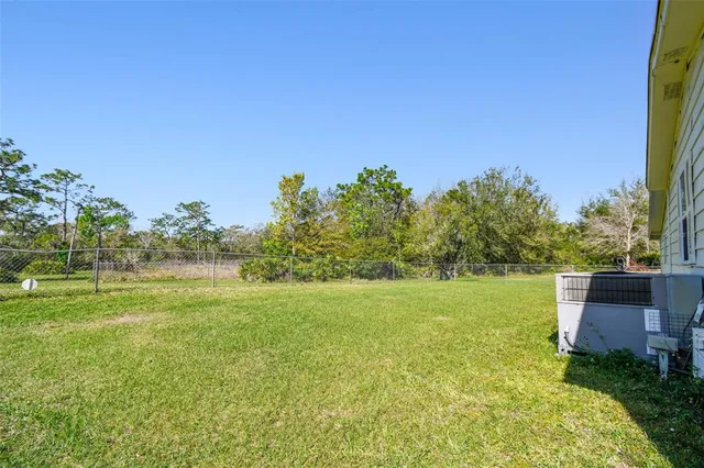a view of a swimming pool with a garden