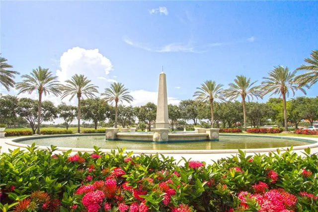 a view of a park with large trees