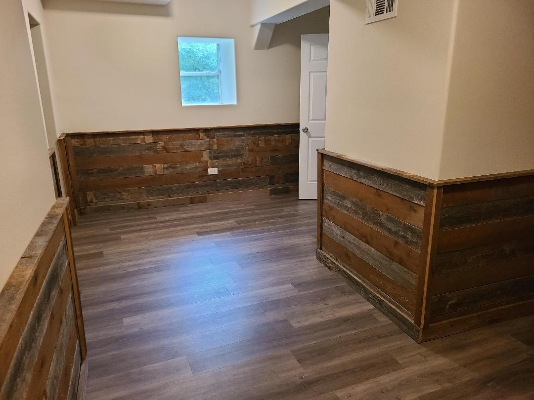 2103 Main Street, Unit L Spring Grove, IL 60081 - Photo 6 of 9 a view of room with wooden floor