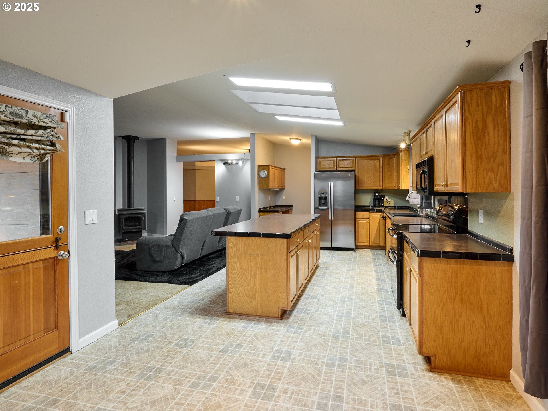 20788 Hazelnut Ridge Road Scotts Mills, OR 97375 - Photo 14 of 46 a large kitchen with cabinets and a counter top space