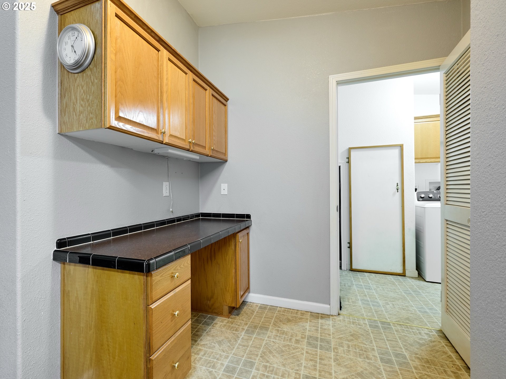 20788 Hazelnut Ridge Road Scotts Mills, OR 97375 - Photo 16 of 46 a view of a refrigerator a stove and cabinets