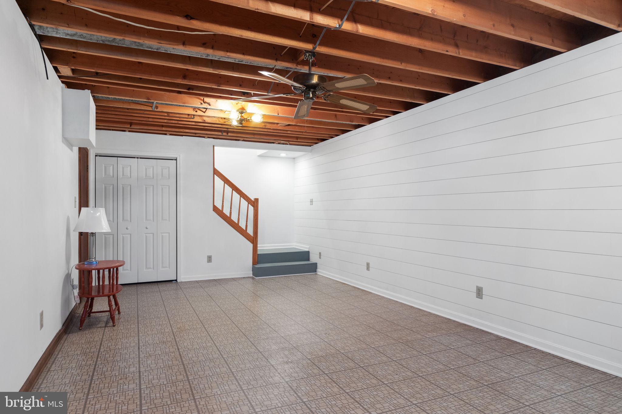 286 Ebenezer Road Bluemont, VA 20135 - Photo 23 of 49 Tile floor, ship lap wall and open rafters