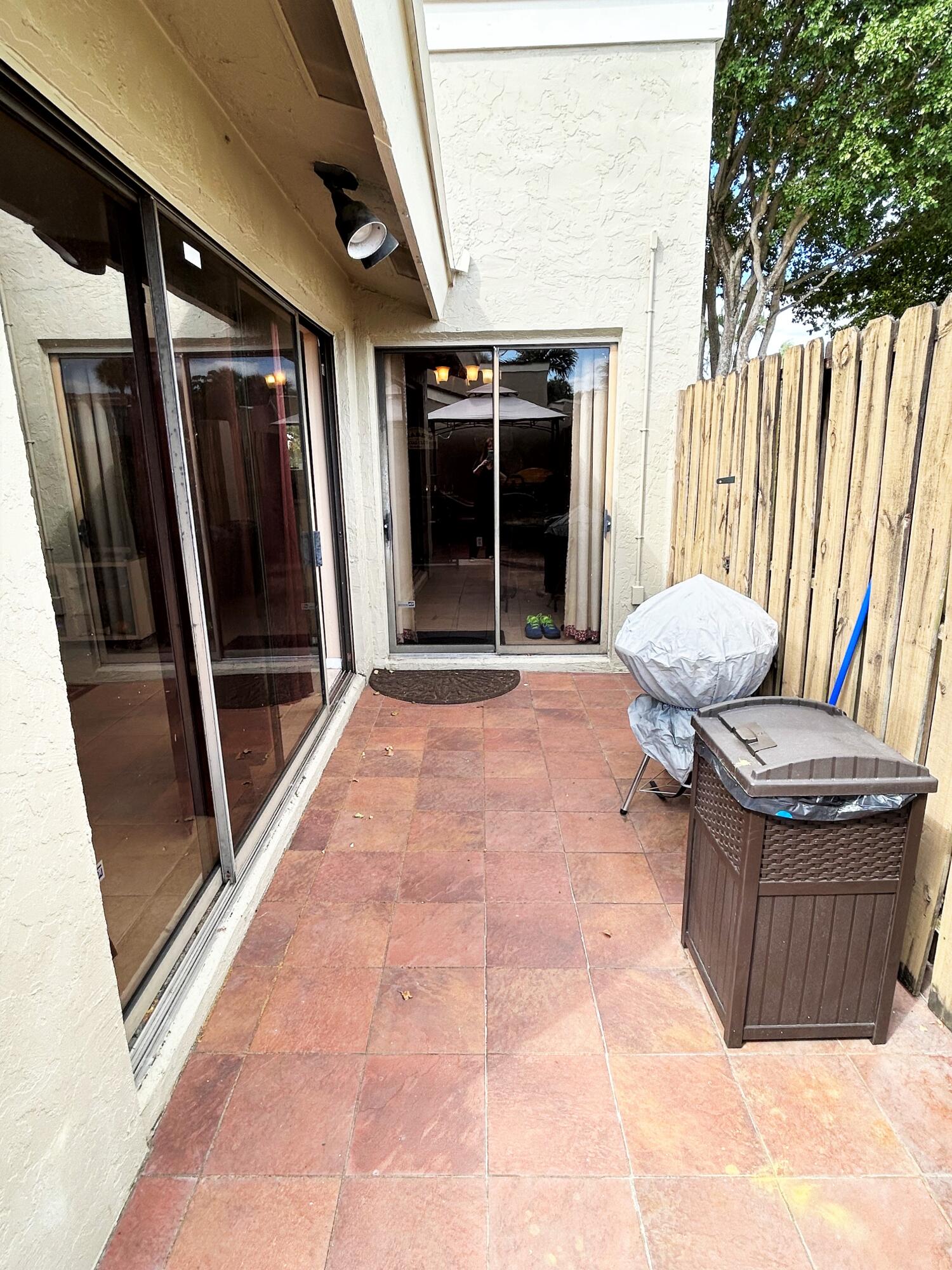 201 Meadows Drive Boynton Beach, FL 33436 - Photo 19 of 40 a living room with a couch and a large window