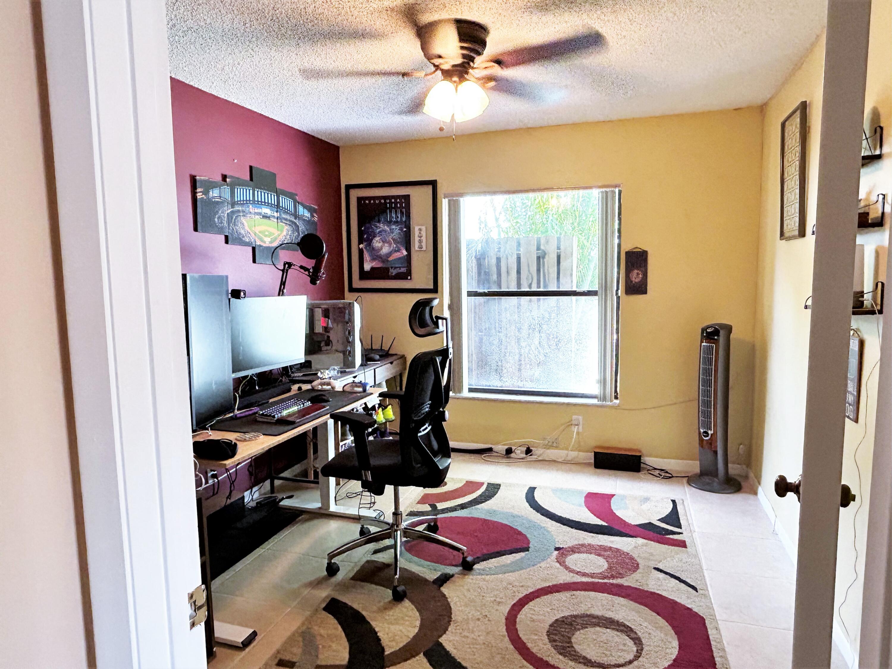 201 Meadows Drive Boynton Beach, FL 33436 - Photo 26 of 40 a work room with furniture and a window
