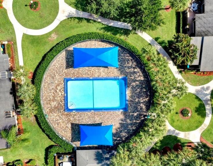 201 Meadows Drive Boynton Beach, FL 33436 - Photo 29 of 40 an aerial view of a house with a swimming pool