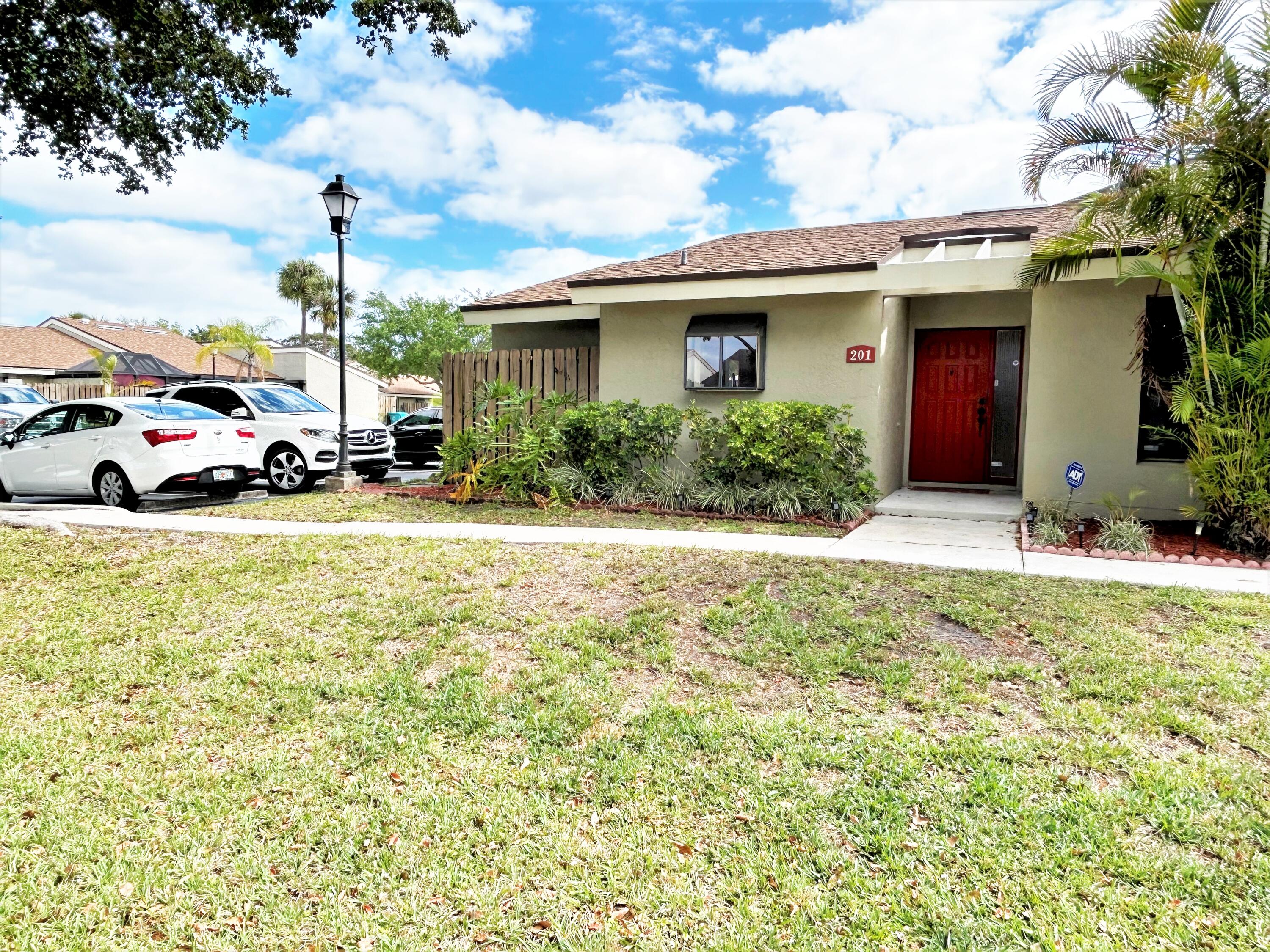 201 Meadows Drive Boynton Beach, FL 33436 - Photo 40 of 40 a view of a house with a patio