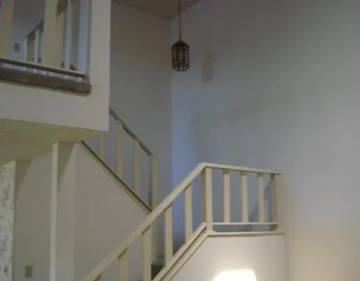 a view of entryway with stairs