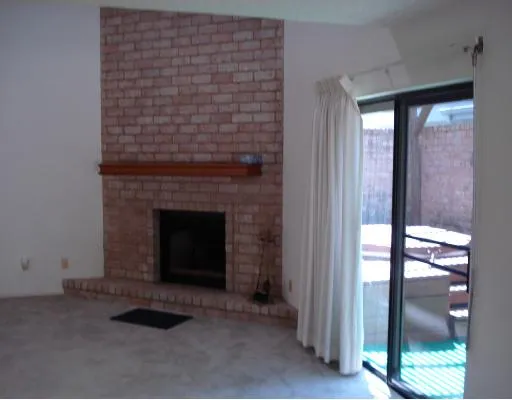 a living room with a fireplace
