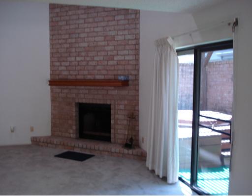 5165 Middlecoff Circle Corpus Christi, TX 78413 - Photo 7 of 10 a living room with a fireplace