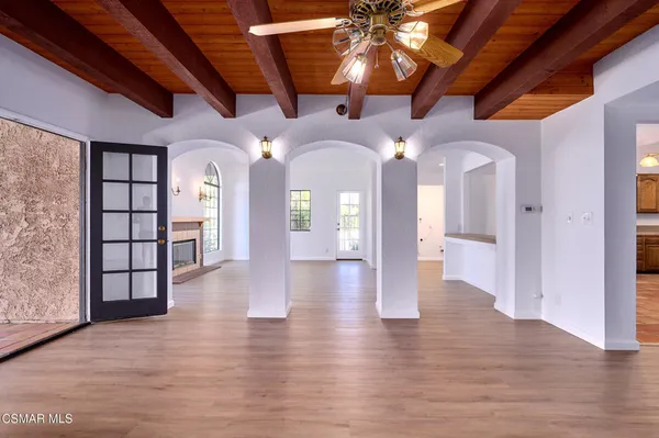 a kitchen that has a lot of cabinets in it
