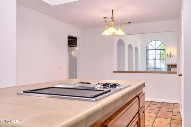 a bathroom with a sink a vanity and a mirror