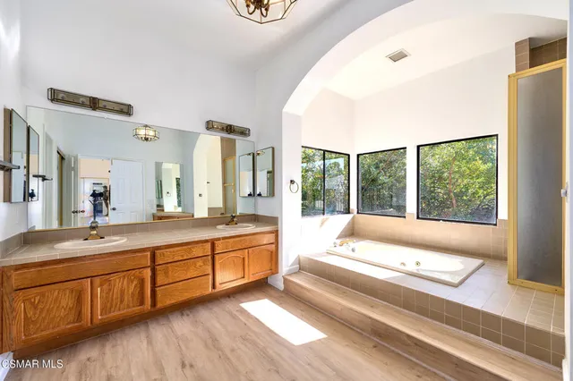 a view of a yard with a tree