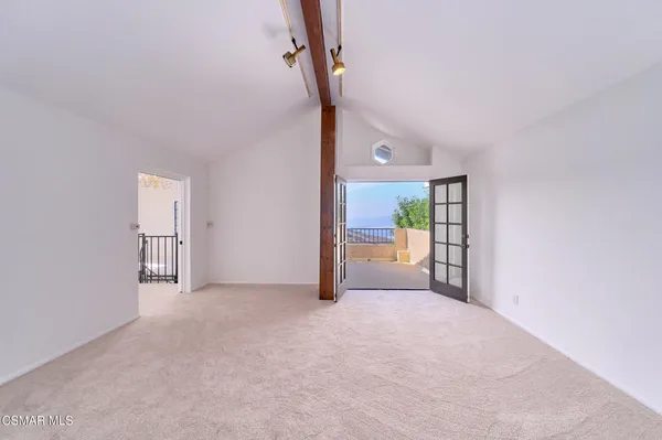 a view of a house with a street