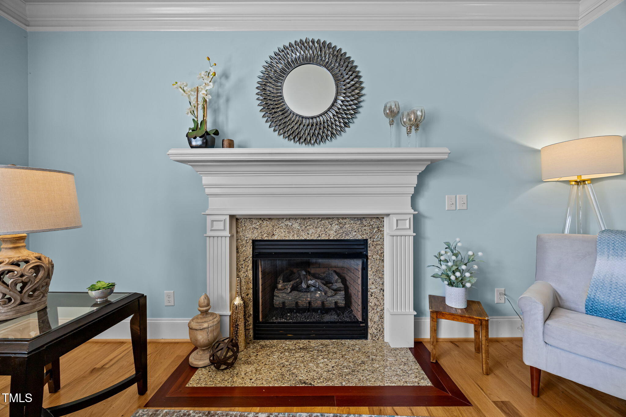 135 Brookstone Way Angier, NC 27501 - Photo 25 of 48 a living room with furniture and a fireplace