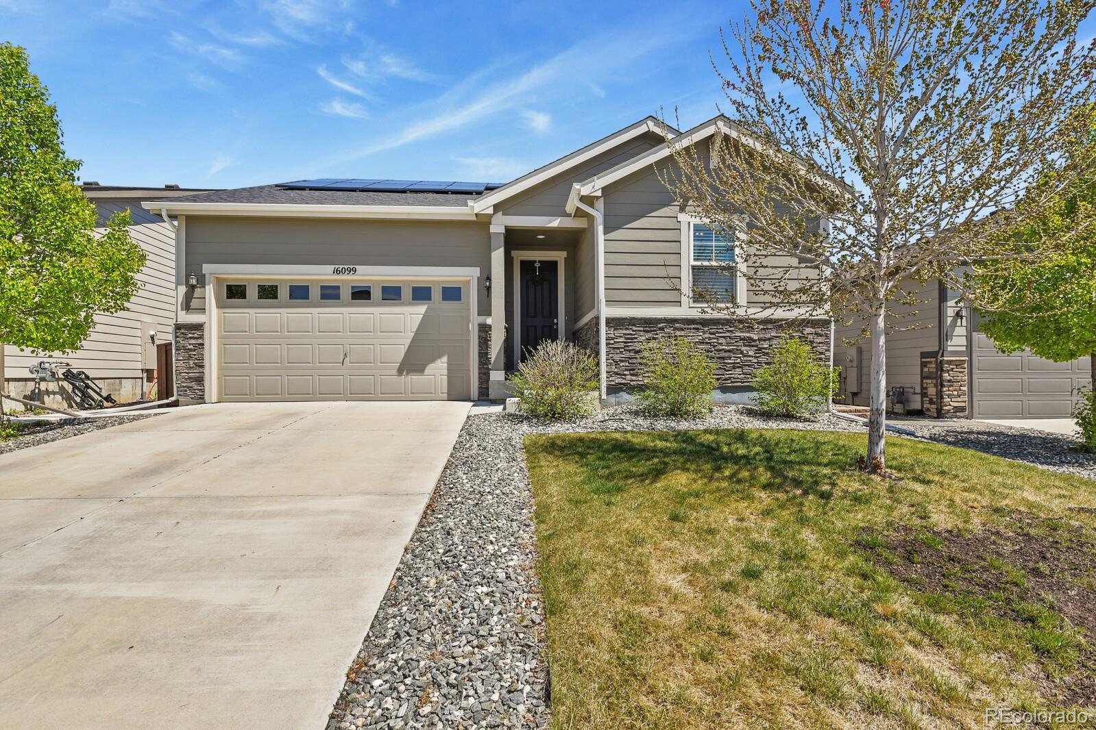16099 Alberta Drive Parker, CO 80134 - Photo 1 of 25 a front view of a house with garden