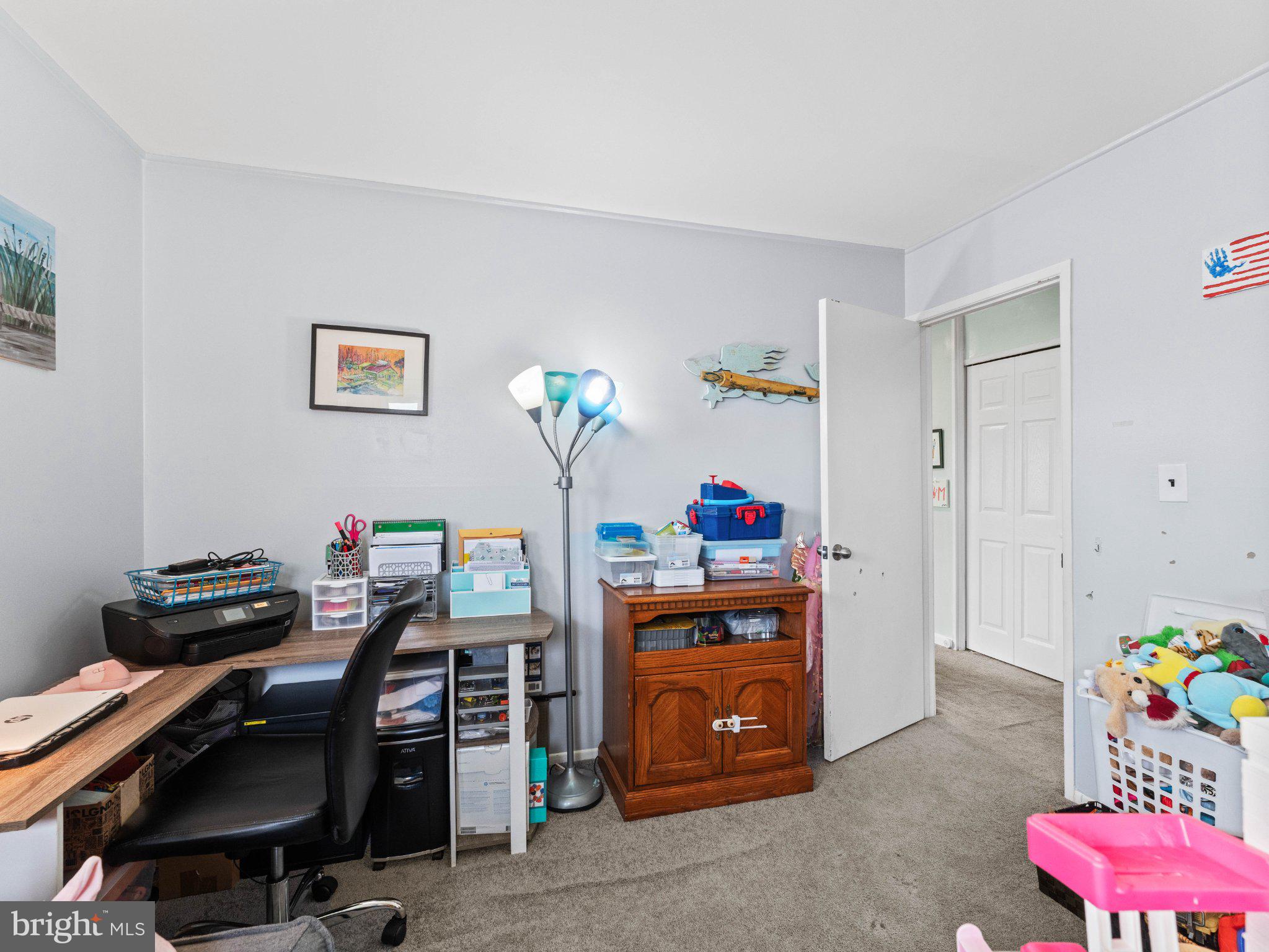 21 Viewpoint Lane Levittown, PA 19054 - Photo 12 of 26 a room with furniture and a window