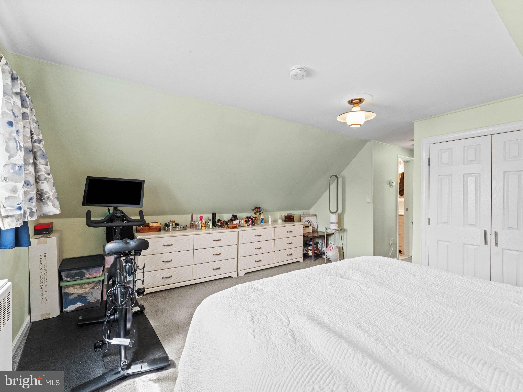 21 Viewpoint Lane Levittown, PA 19054 - Photo 17 of 26 a bed room with a bed and a window
