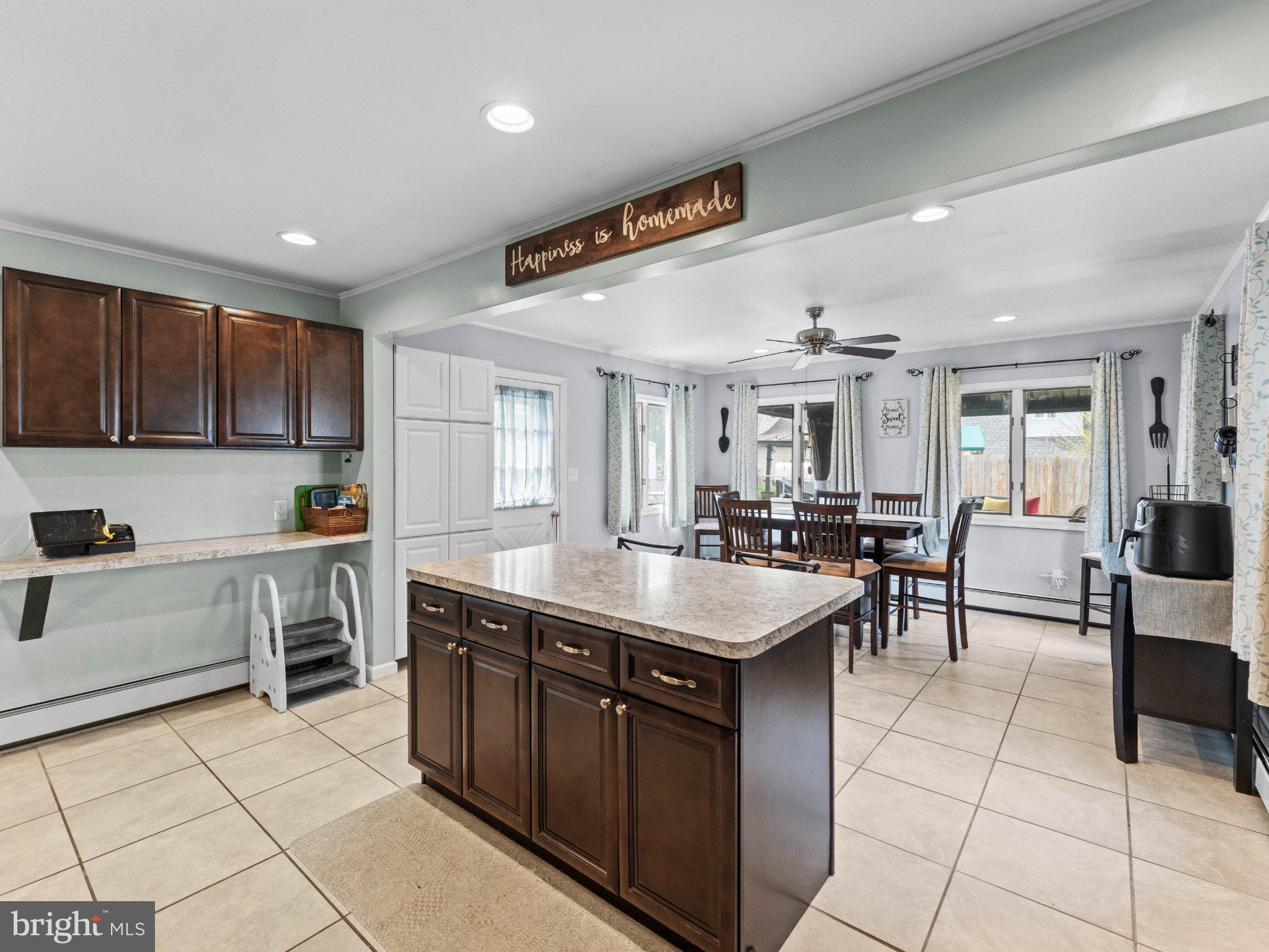 21 Viewpoint Lane Levittown, PA 19054 - Photo 7 of 26 a kitchen with sink cabinets and stove top oven