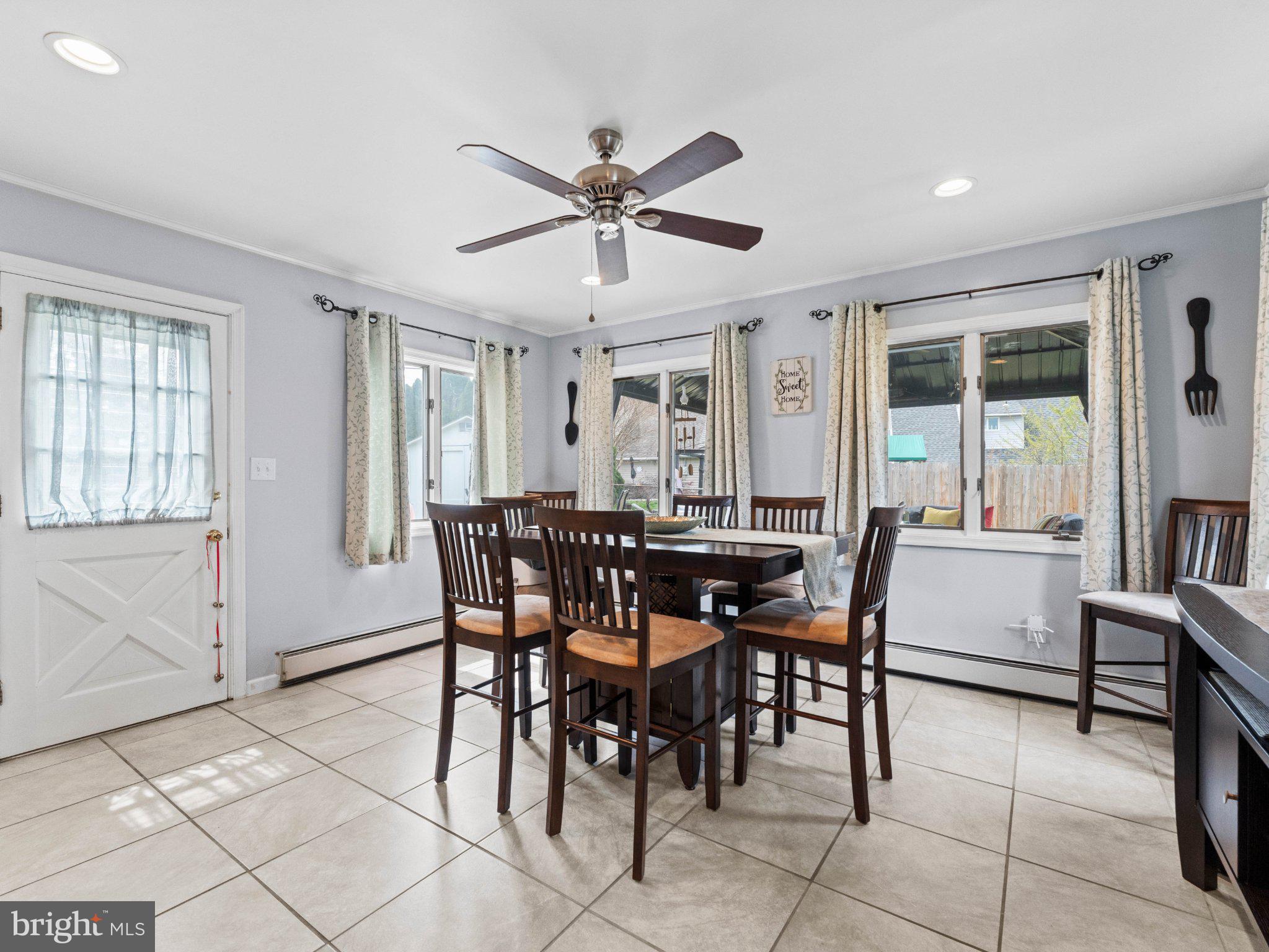 21 Viewpoint Lane Levittown, PA 19054 - Photo 10 of 26 a dining room with furniture and window
