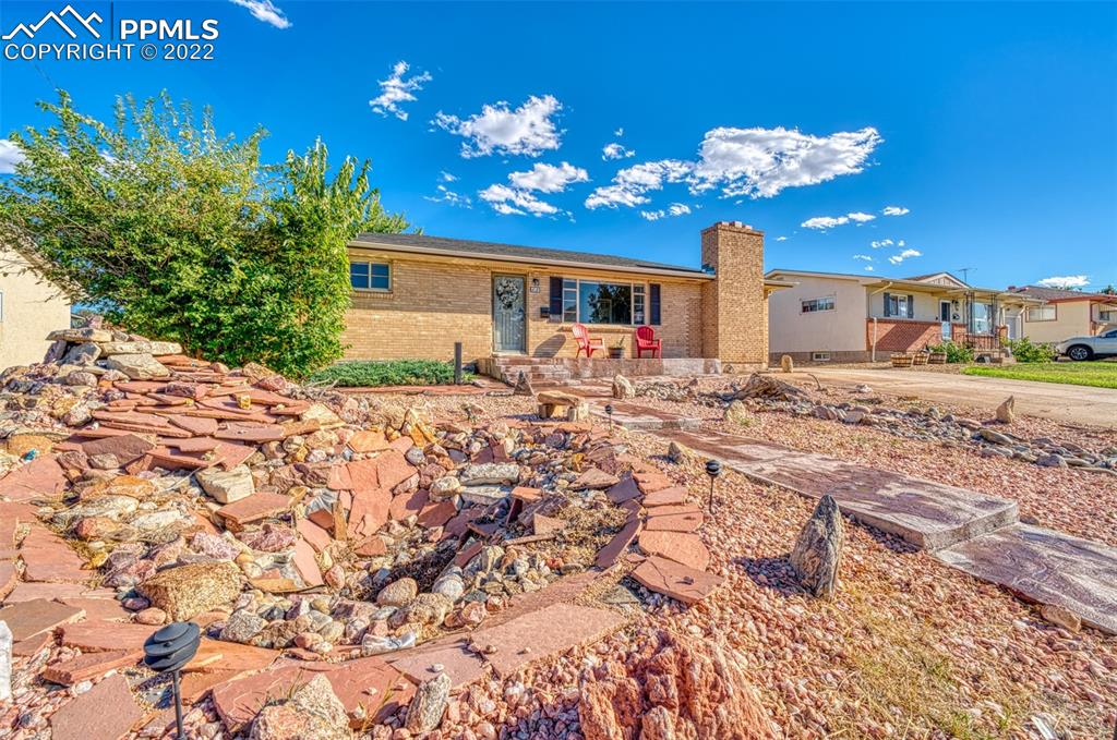 48 Duke Street Pueblo, CO 81005 - Photo 21 of 29 a view of a house with a yard