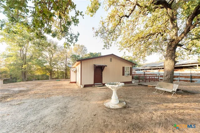 a view of a house with a patio