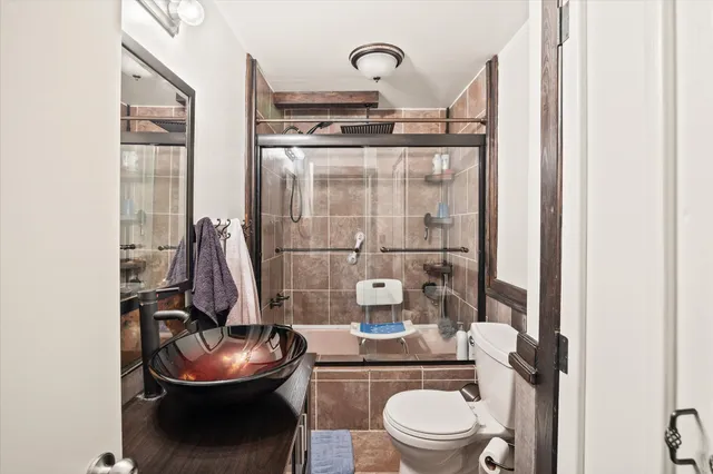 a bathroom with a toilet and a sink