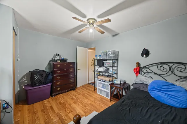 a bedroom with a bed and closet