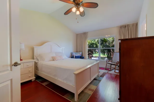 a bed room with a bed and a window