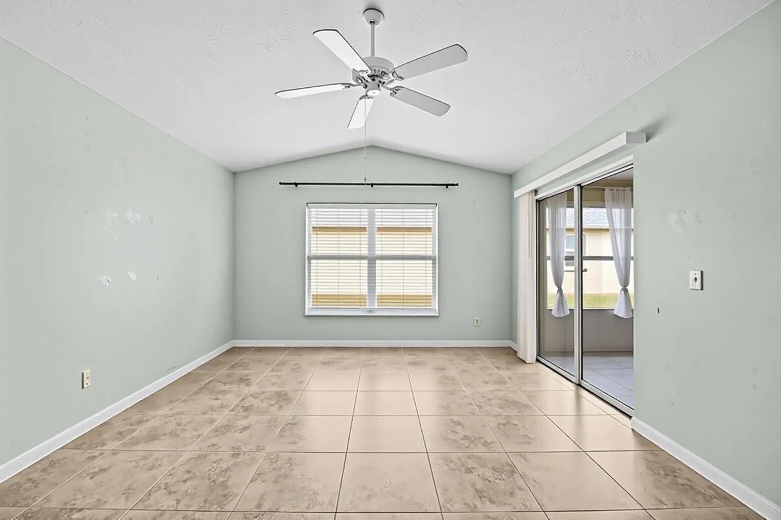 5925 Foxtail Way Fort Pierce, FL 34982 - Photo 12 of 29 a view of an empty room with a window