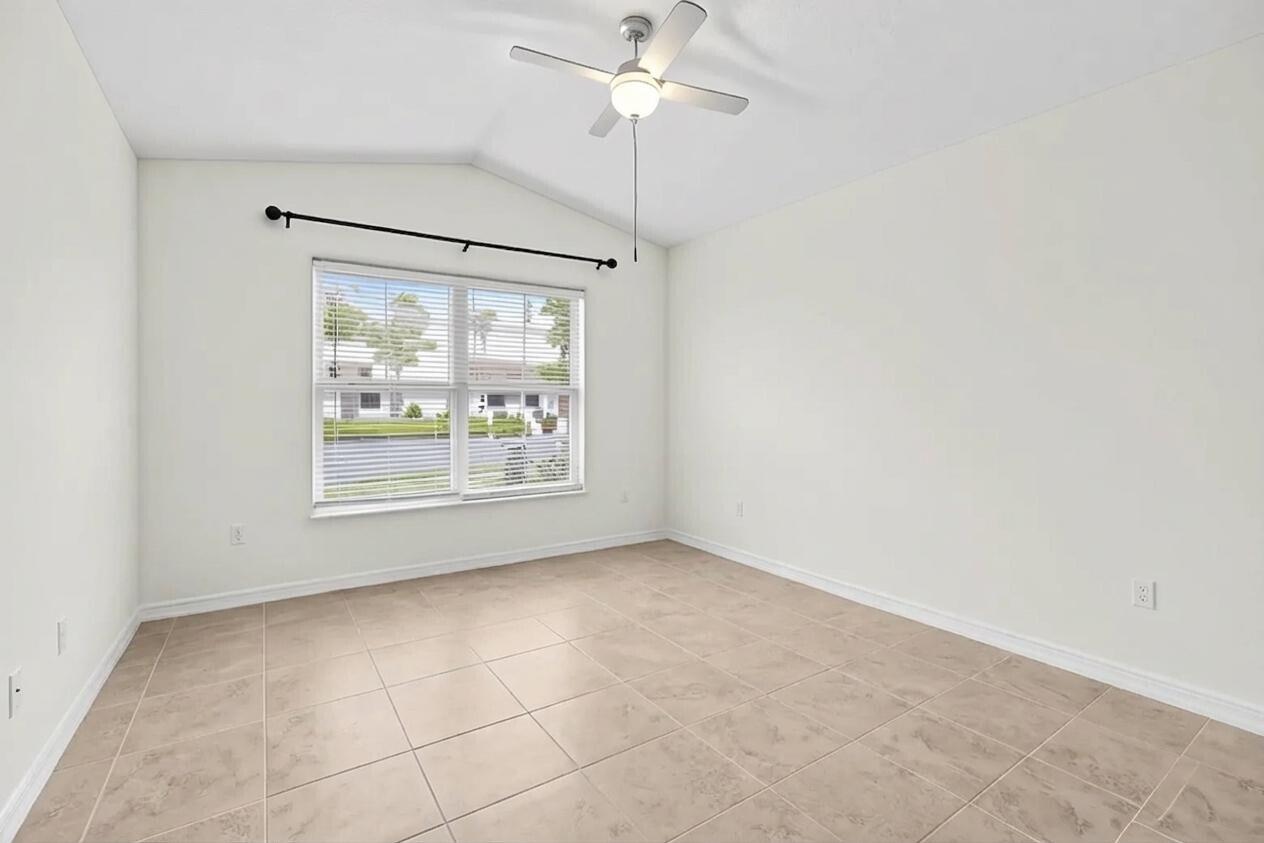 5925 Foxtail Way Fort Pierce, FL 34982 - Photo 16 of 29 a view of an empty room with a window