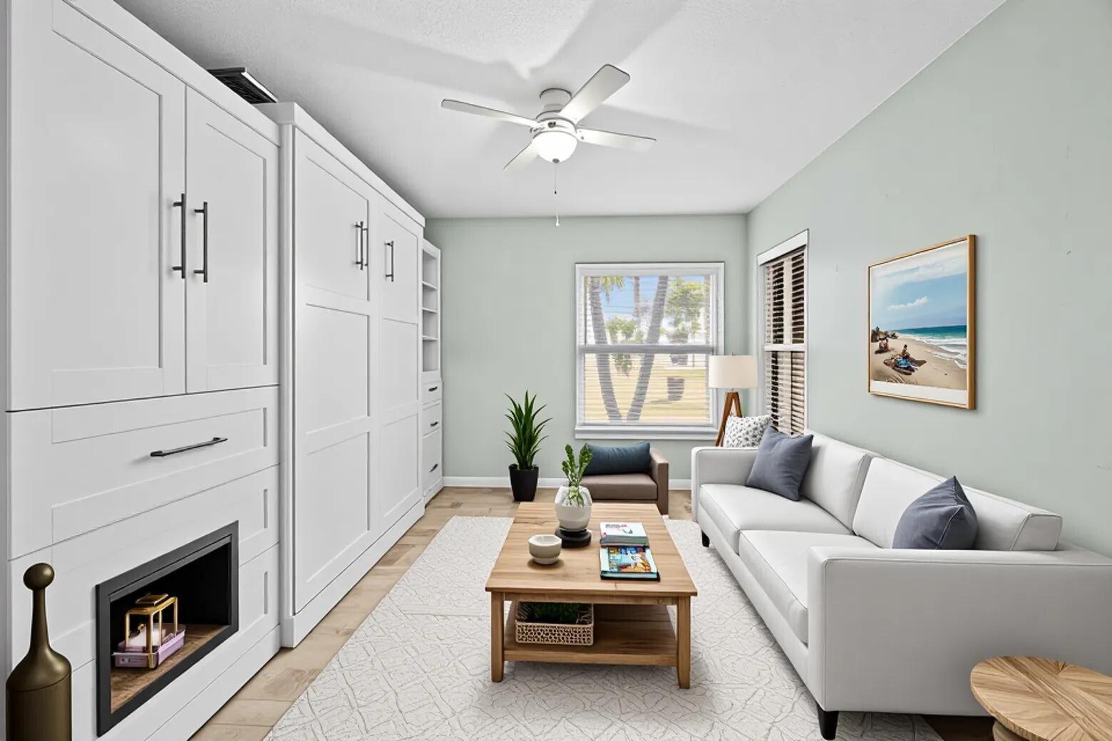5925 Foxtail Way Fort Pierce, FL 34982 - Photo 18 of 29 a living room with furniture a fireplace and a table