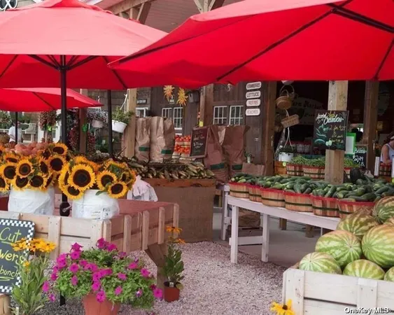 a view of a building with sitting area