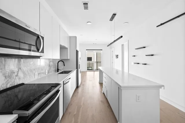 a view of a terrace with sitting area